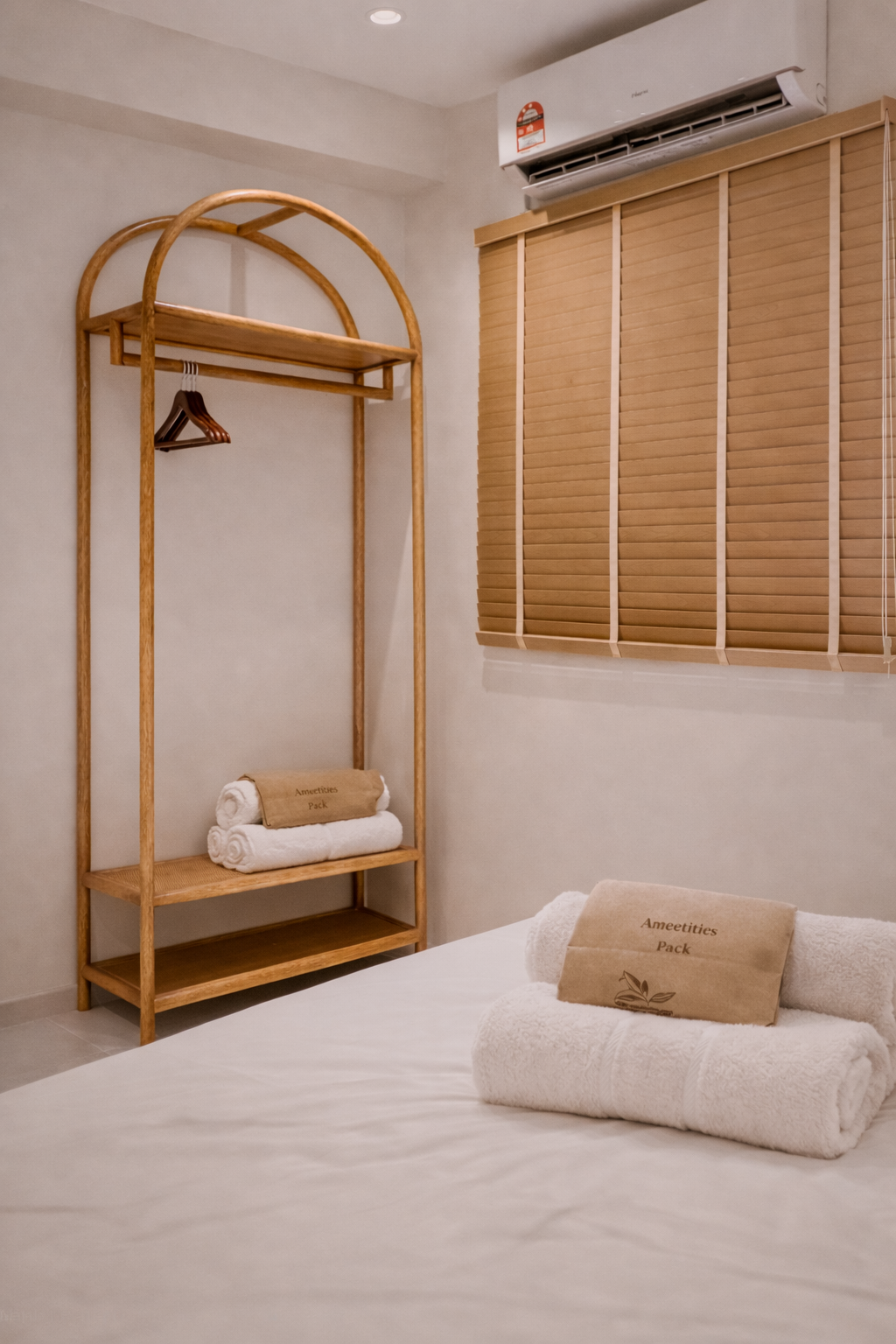 An open wardrobe with extra towels.